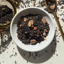 Load image into Gallery viewer, organic spiced chai with cardamon, cinanmon, cloves, dried ginger, star anise, black pepper corns
